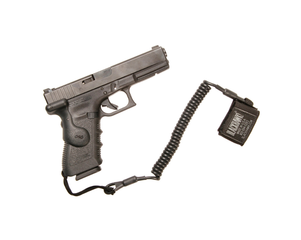 Tactical pistol lanyard coiled