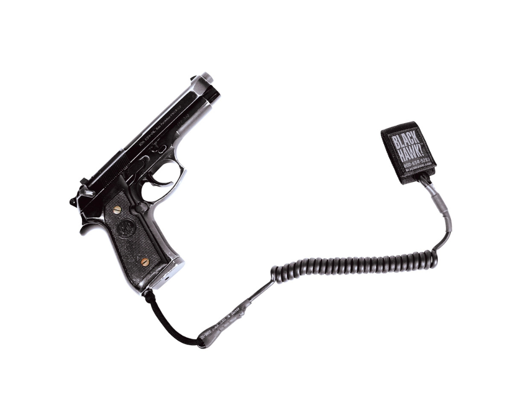 Tactical pistol lanyard coiled